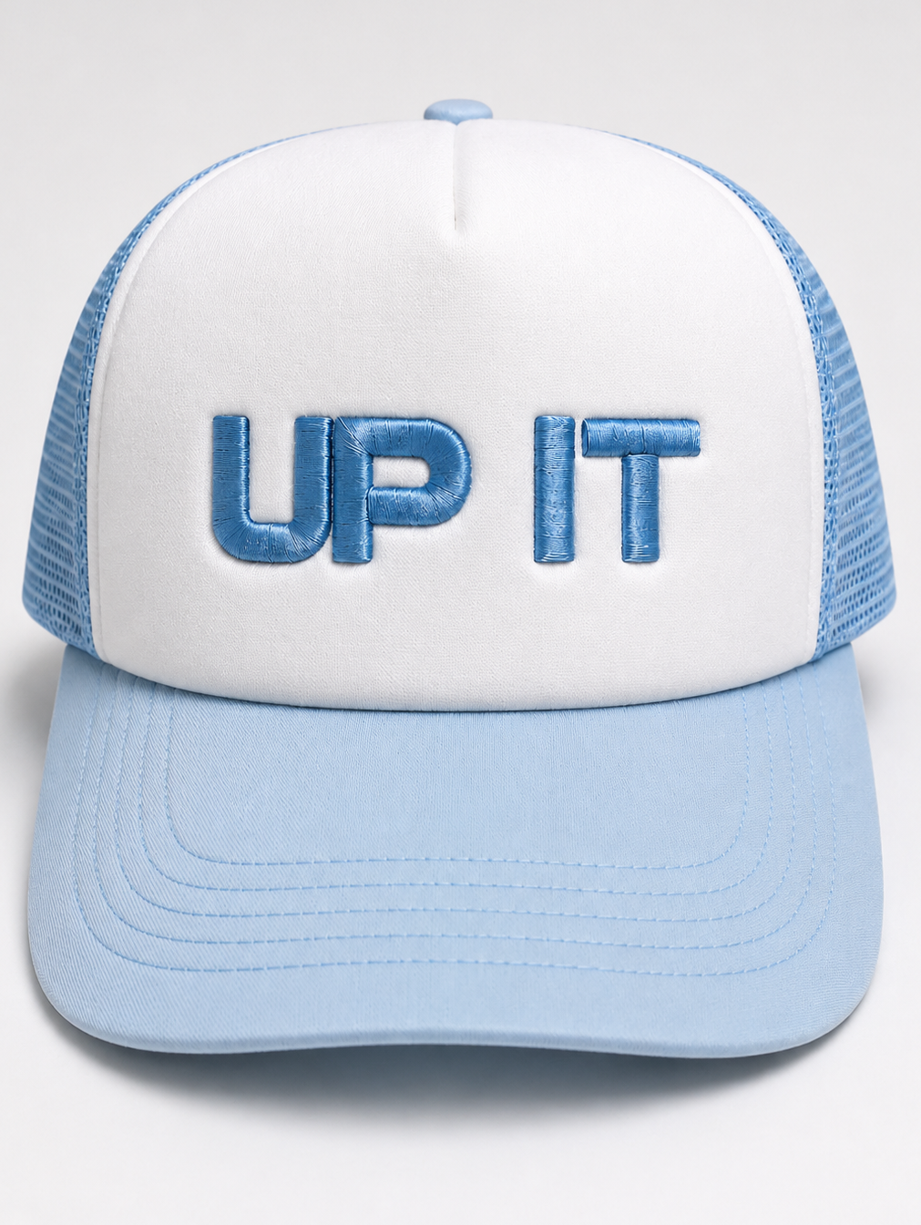 UP IT white and blue trucker cap with raised 3D stitched logo and mesh back